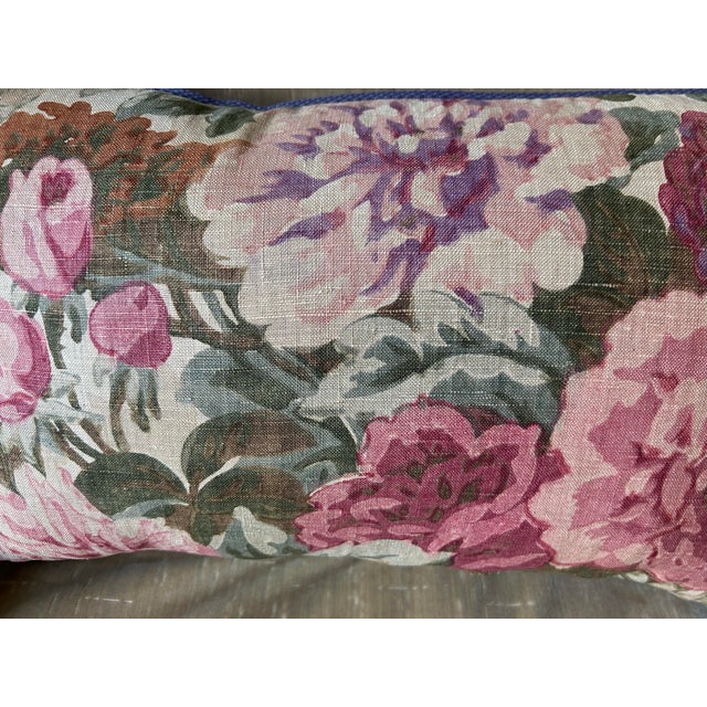 A pillow made from a Circa 1920s English printed linen. A down insert is included.