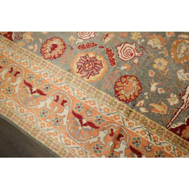 An early 20th-century Turkish Rug with an animal motif, pictorial motif attributed to Indian Rugs in deeply saturated colors