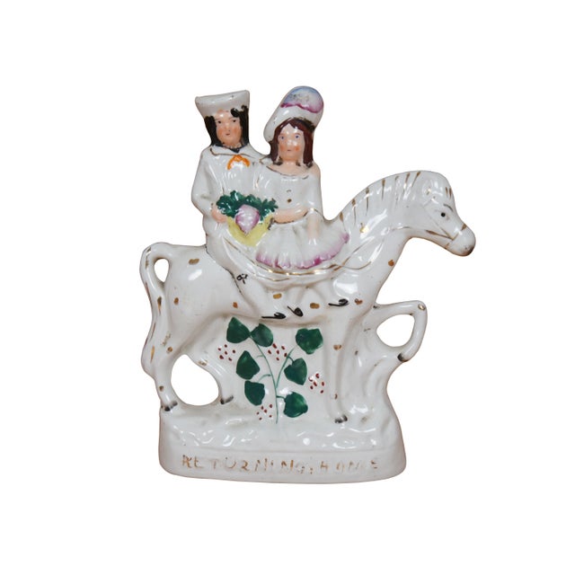 Pair of antique 19th century Staffordshire porcelain flatback equestrian mantel figurines titled "Going to Market" and...