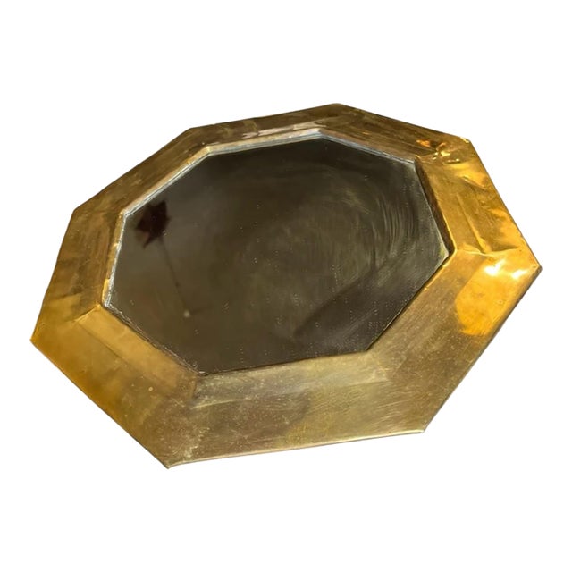 Great patina. Signs of use and it handling. Hanging hardware attached to back. Great accent mirror for wall or counter....