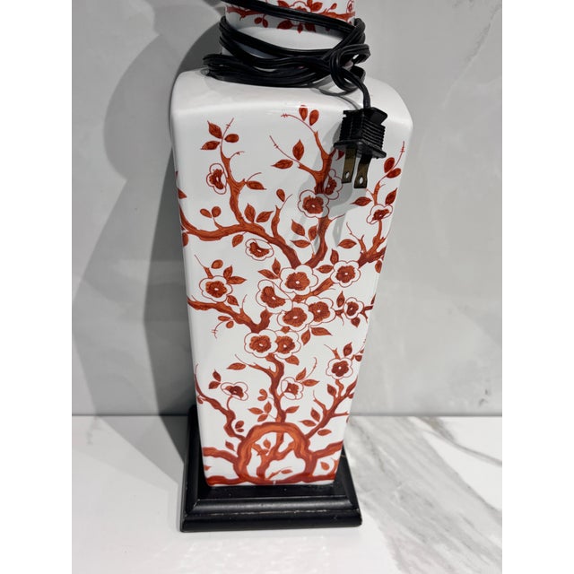 This is a vintage mid-20th-century Chinoiserie or Japanese porcelain vase table lamp featuring a hand-painted red cherry...
