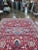 Exact Size: 9'8" x 12'7" Color: Red Age: Old Materials: Wool Construction: Hand Knotted