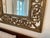 hand carved wood wall mirror a beautiful accent piece.