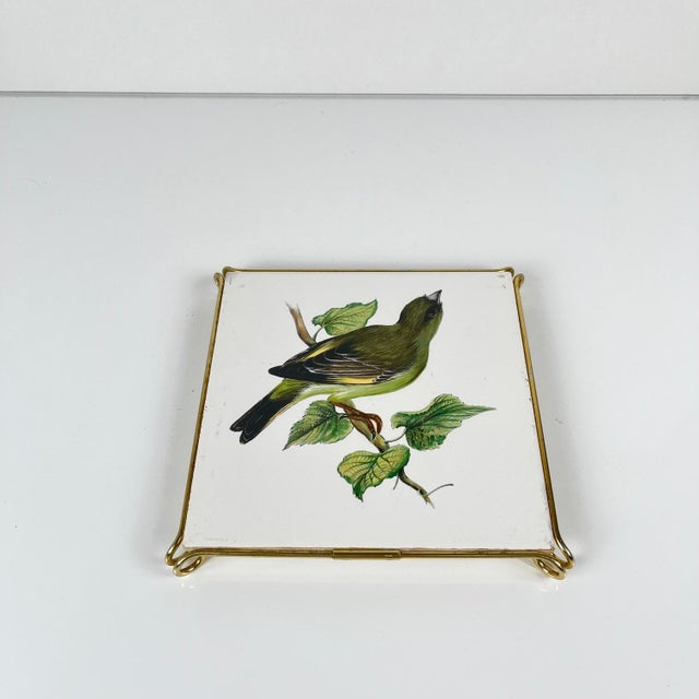 Villeroy & Boch trivet, between 1947 and 1956 Antique tile with bird motif European greenfinch, mounted as a trivet with a...