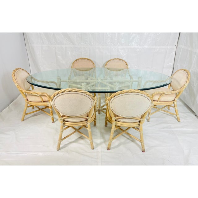 A rare and highly desirable complete vintage dining set by McGuire Furniture, designed and manufactured in San Francisco,...