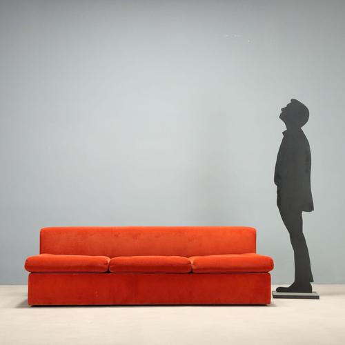 Three-seater Zanotta sofa, crafted between the 1970s and '80s. It features original brick-colored fabric upholstery,...