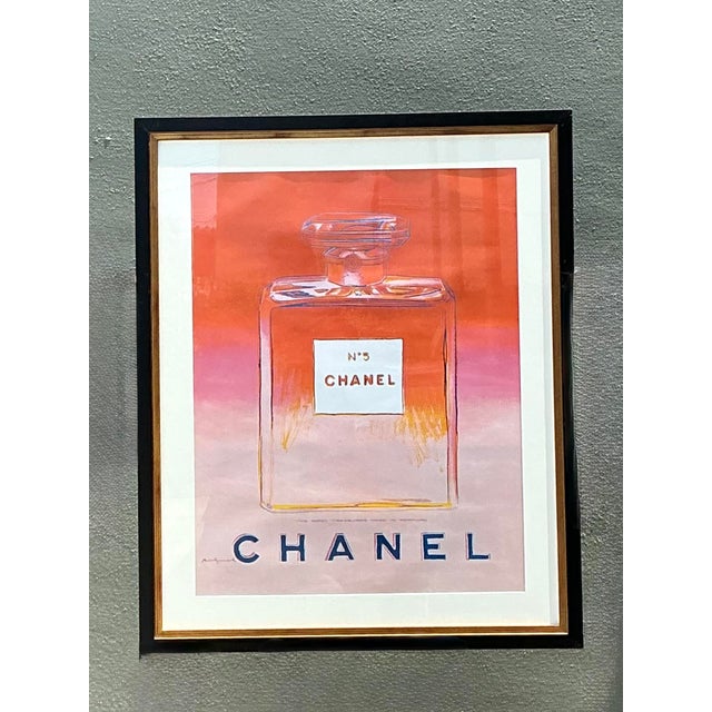 This striking framed advertising poster is a celebratory fusion of high fashion and Pop Art, featuring the iconic...