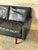 This compact loveseat features clean lines and plush cushions, delivering a sleek profile. Elevated on tapered legs, it...
