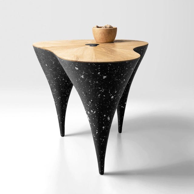 Coffee table "still poise" each piece combines a solid oak tabletop with a sculptural base made from a durable composite...