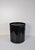 Black RM wastebasket, designed by Richard Müller. Simple and functional aesthetics made of metal with a classic industrial...