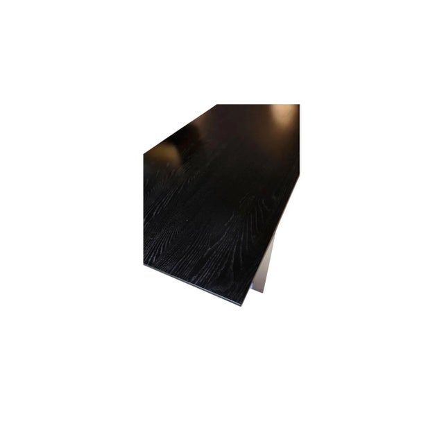 Coffee table with aluminum frame and black ash wood of hubs model ak 132. In very good condition. No longer in production....