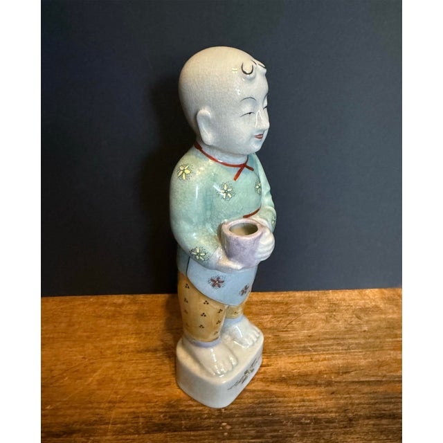 This is amazing! This gorgeous Ho Ho Boy is a Republic Period Chinese porcelain figure of a boy decorated in traditional...