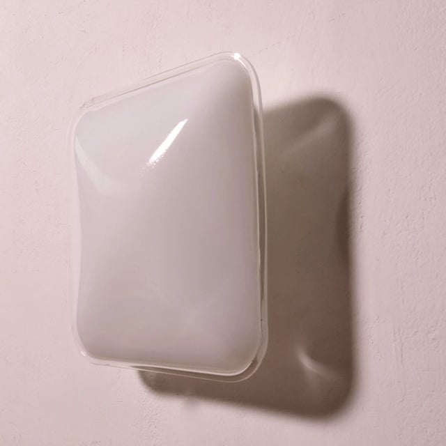 Wall sconce lamp by Leucos for Murano. Dimensions: 38x38 cm Depth: 15 cm This piece has an attribution mark, I am sure...