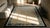 Enchanting Beige Background Color and Black Border With Tone-on-Tone Pattern Antique Chinese Peking Rug For Sale - Image 13 of 15