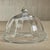 Enliven your serving game with a clear glass plate with dome lid. This round cloche with platter base serves as the...