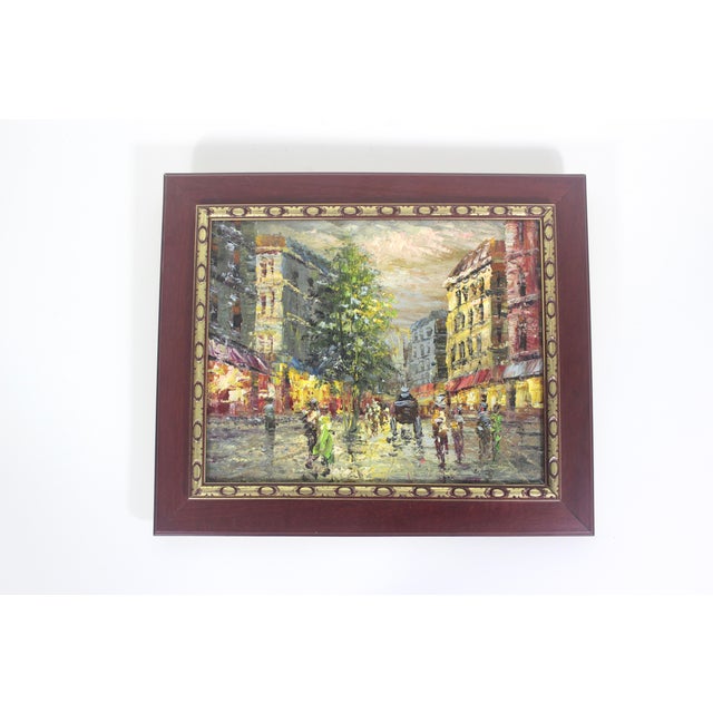 Vintage original oil painting. Impressionist style of a European city scene. The paint has nice texture. The painting is...