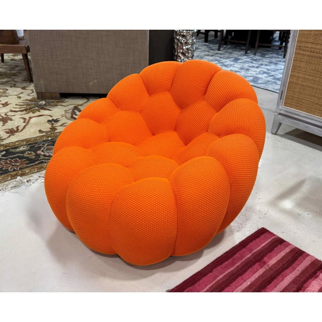 Roche Bobois Bubble Pivoting Armchair, upholstered in orange Techno 3D fabric. Designed by Sacha Lakic. Excellent Condition.