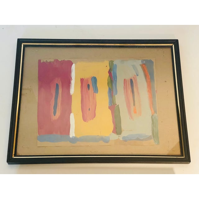 Pair of small abstract acrylics on brown paper, signed by artist and framed under glass.