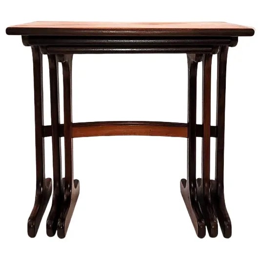 Set of three nested tables produced by the Ebenezer Gomme ( E. Gomme ) furniture company in High Wycombe, England, for...