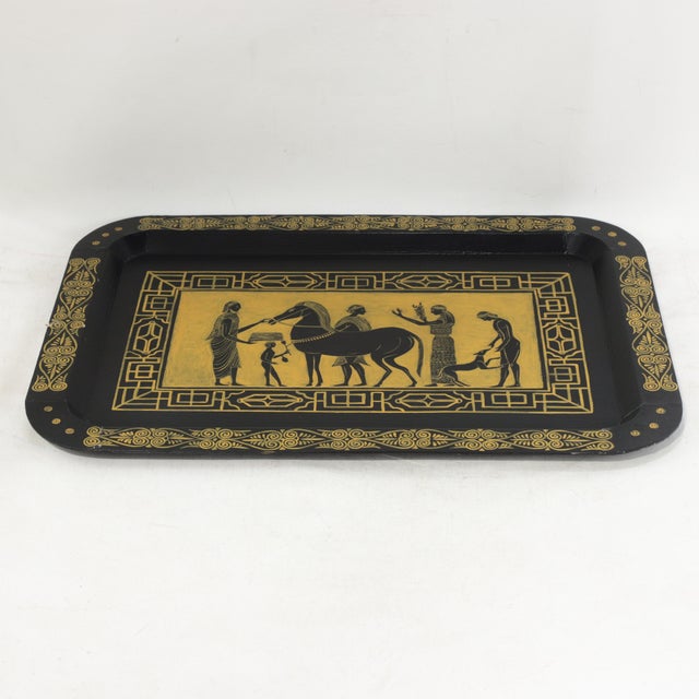 This striking vintage hand-painted metal tole tray features a dramatic Egyptian Revival aesthetic, showcasing a bold black...