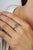 The Modernist 0.98 Ct Natural Emerald Pear & Octagon Toi et Moi Ring features 0.98 carats of natural emeralds set in 925...