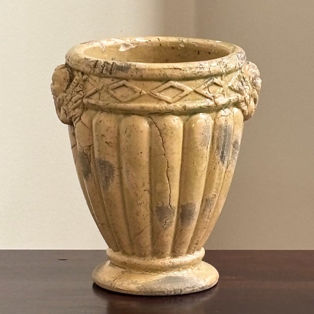 A petite and very charming Neoclassical-style garden urn /planter from the mid- to early-20th century. This beautiful urn-...