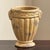 A petite and very charming Neoclassical-style garden urn /planter from the mid- to early-20th century. This beautiful urn-...