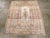 This Mid-20th century Turkish Sivas rug, measuring 3' 2" x 3' 7", showcases a finely drawn prayer design imbued with the...