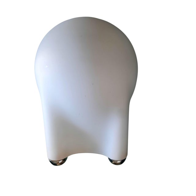 The Drop table lamp, designed by Giotto Stoppino in 1976 and produced by Tronconi (published by Enrico Tronconi), is a...