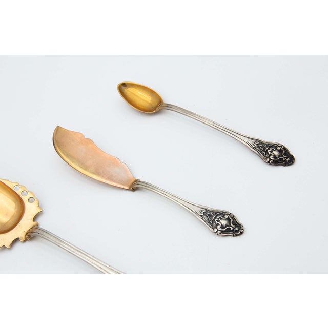 Serving Cutlery Set in Gold-Plated Silver with Shells, Set of 9, in Good conditions. Designed 1920 to 1949