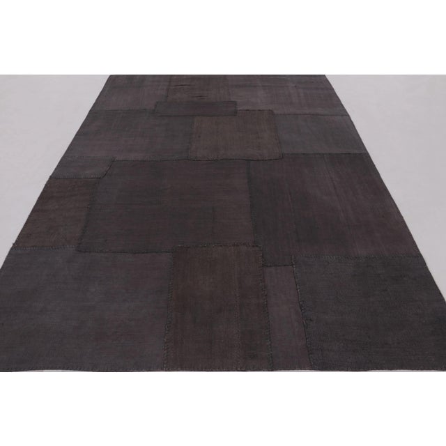 This 7x10 vintage patchwork rug is an evocative addition to Rug & Kilim’s collection, a masterpiece of Turkish hemp...
