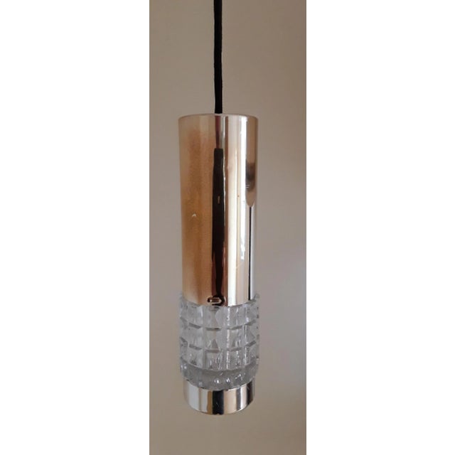 German Cylindrical Ceiling Lamp in Chromed Metal with Relief Glass Insert & Black Plastic Mount from Kaiser, 1970s, in...