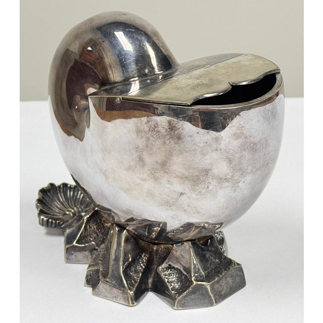 A stunning antique circa 1880s heavy English silver plated nautilus shaped spoon warmer. Age wear. No significant dents or...