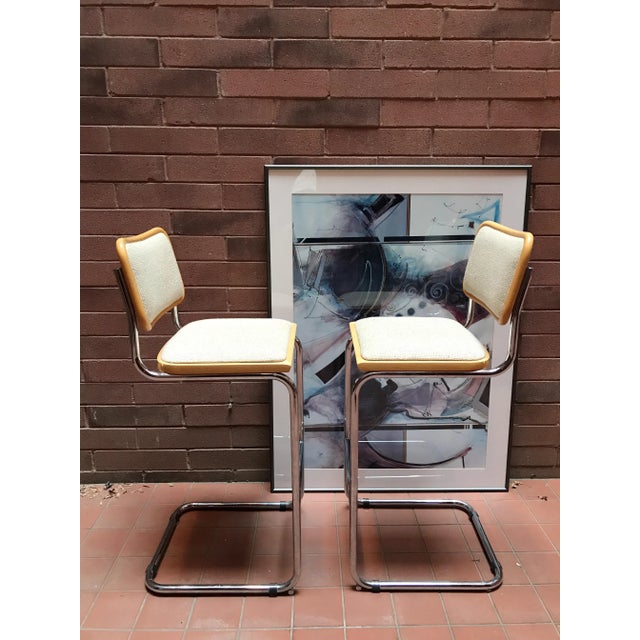 Beautiful and comfortable vintage chrome tubular cantilevered bar stools with upholstered seats. Clean original upholstery...