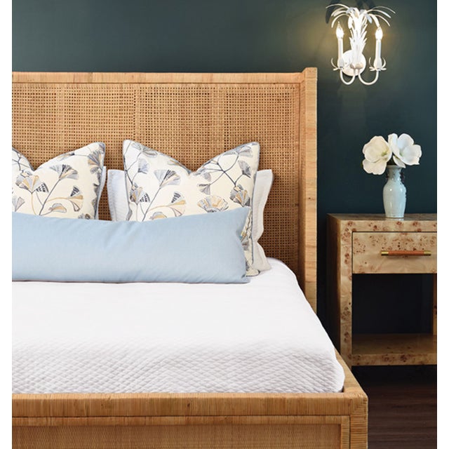 Introducing the Dolly Headboard - a winged headboard and platform, crafted from radio weave wrapped rattan. This unique...