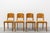Set of four chairs made of birch wood, in Art Deco style and period. Crafted in honey-toned birch burl, they feature a...