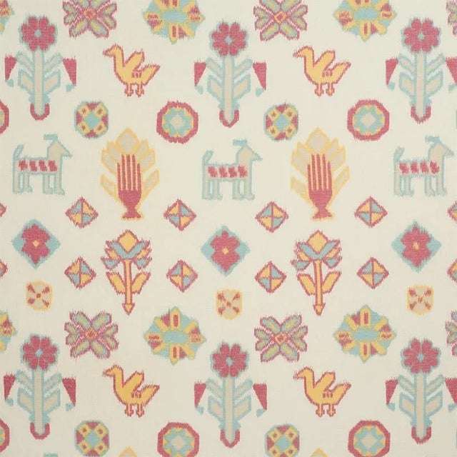 Figurative horses, birds, and flowers mingle across this happy pattern-a true warp print in an ikat style that's charming,...