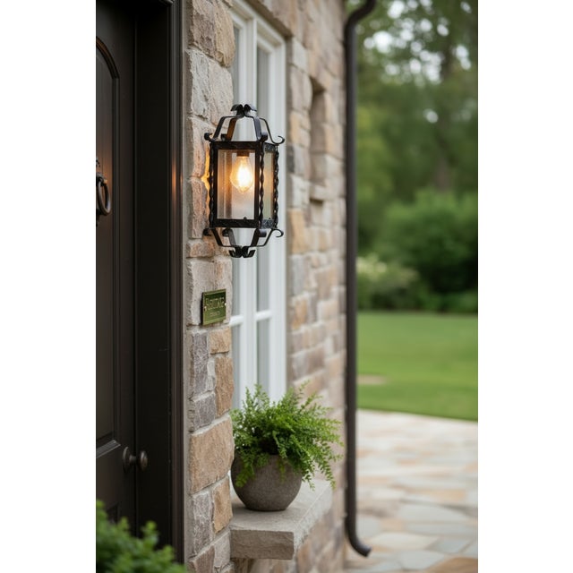 Set of 8 wrought iron wall sconces, 1960s these mid-century wrought iron wall sconces date back to 1960s and showcase...