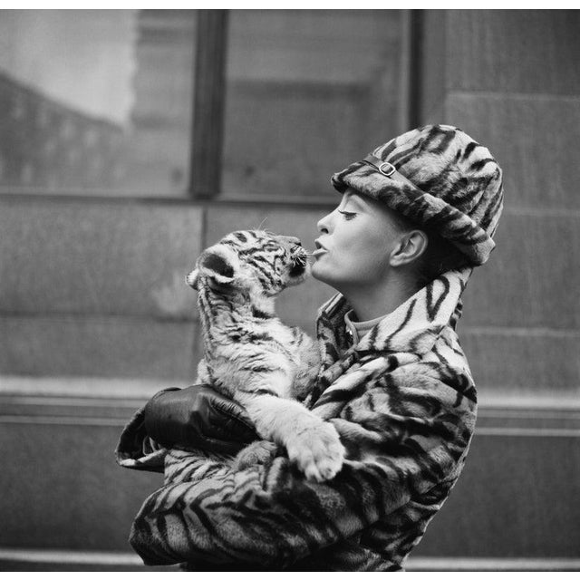 Tiger Lady 16th March 1971: Air Stewardess Cynthia Robertson models the new uniform for National Airlines. A synthetic...