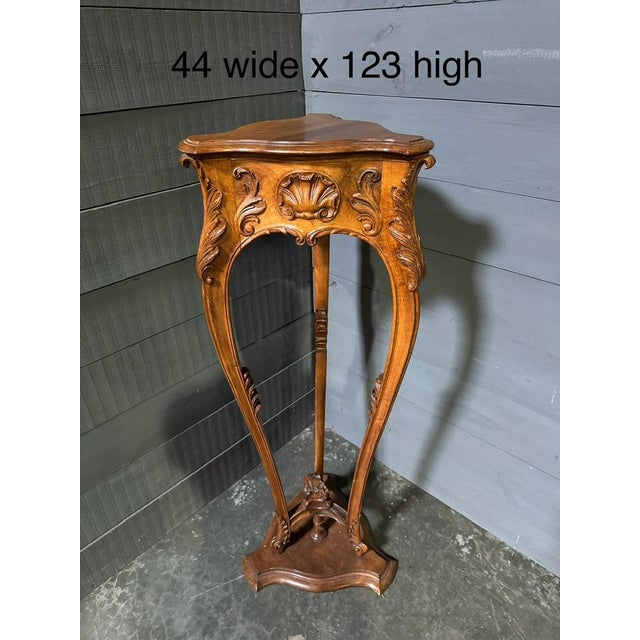 A beautiful French rococo Stand. Superb quality and design made from solid Walnut, the carving is crisp and wonderfully...