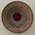 This handcrafted art studio earthenware wall decor bowl features a central red medallion design, adding a unique touch to...