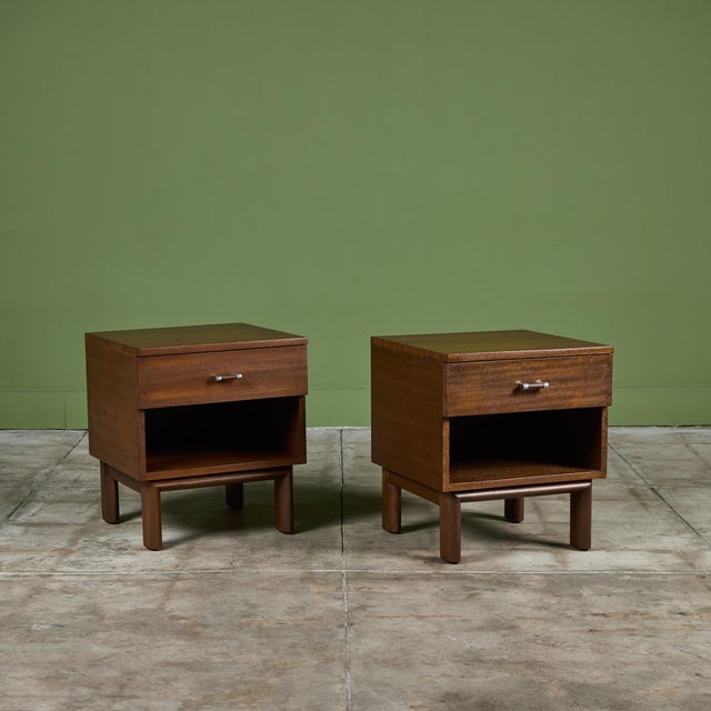 Pair of mahogany nightstands by John Keal for Brown Saltman, c.1950s, USA. This minimal design features an upper drawer...