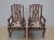 Suite of 4 seats - 2 armchairs and 2 chairs - in light mahogany with inlaid darker mahogany fillets. The seats are covered...