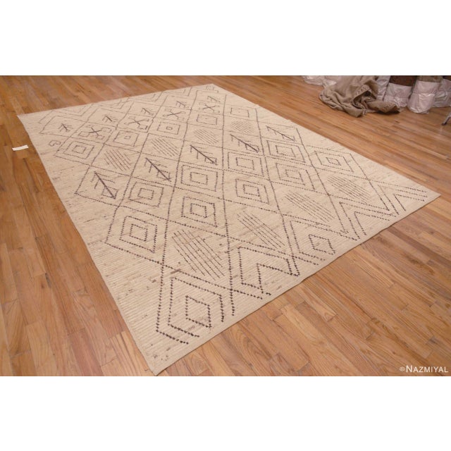 Captivating and Decorative Modern Ivory Cream Tribal Geometric Moroccan Beni Ourain Design Rug, Country Of Origin: Central...