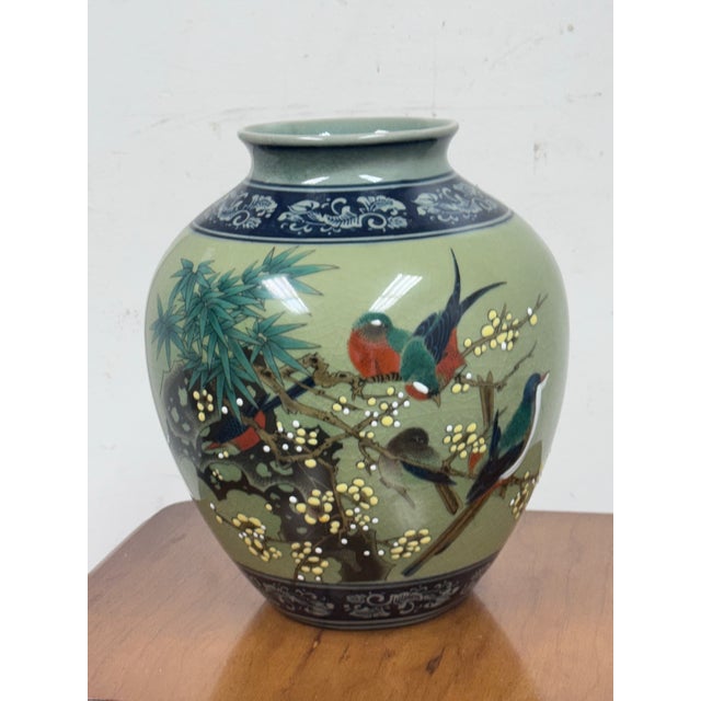 Design Plus Gallery presents Jar Mouth Vase of Japanase Style. The body of the entire vase is in a jade green color. The...