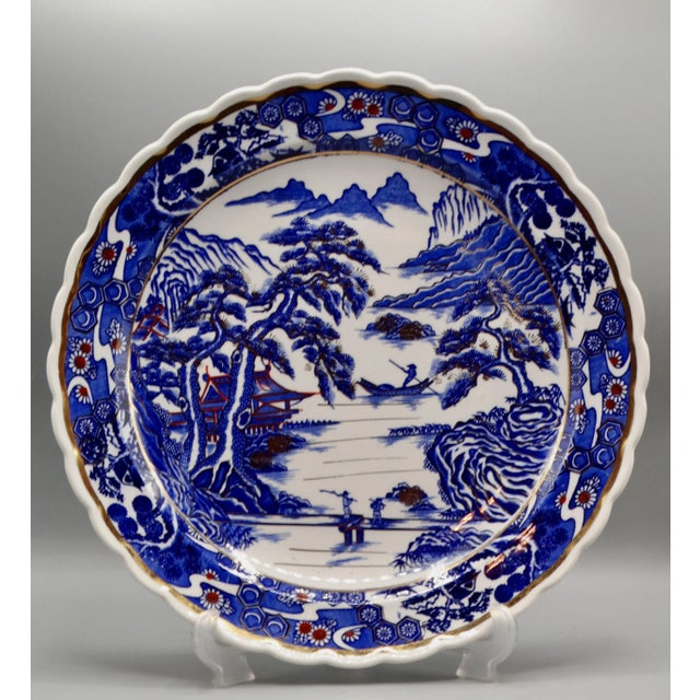 Large beautifully hand painted Chinese charger measuring 14" in diameter. The central panel depicts a traditional Chinese...