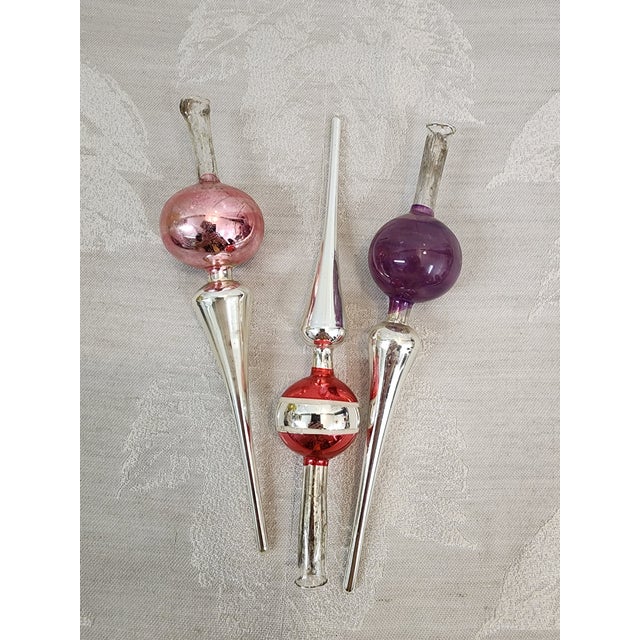 Ornaments measure betqeen 8-9 inches and date back to the 1920's. The condition is beautiful for the age of the 3 and will...