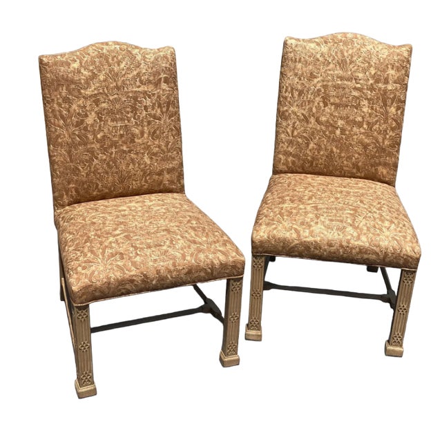 This is a pair of vintage side chairs that are really unique. The frame of each chair is wood and has a beautiful leg...