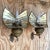 An exceptional pair of vintage Boho gas wall lanterns. Made by the iconic Wheeler Reflector Co. and tagged on the back....
