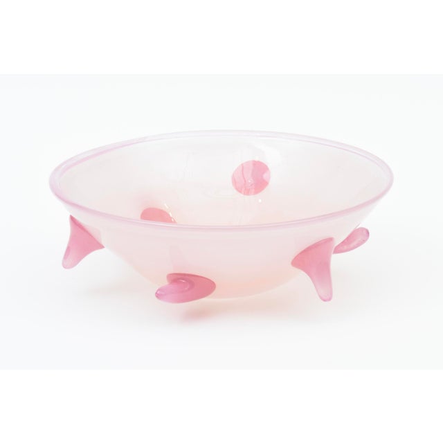 This lovely seductive pink art glass bowl is one of a kind and has protruding nipple designs. It is American and signed...